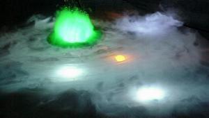 LED underwater lights with mist generator in pond